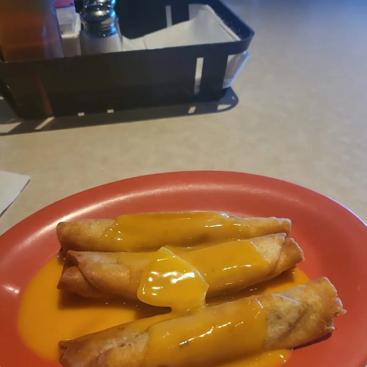 Flautas with Cheese Sauce