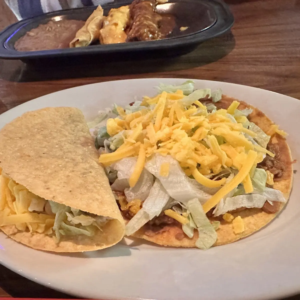 Shredded Chicken Tostada with Cheese and Lettuce