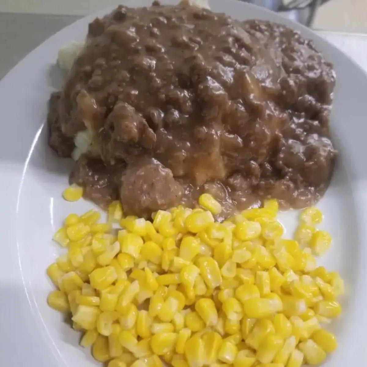 Hamburger Gravy over Mashed Potatoes