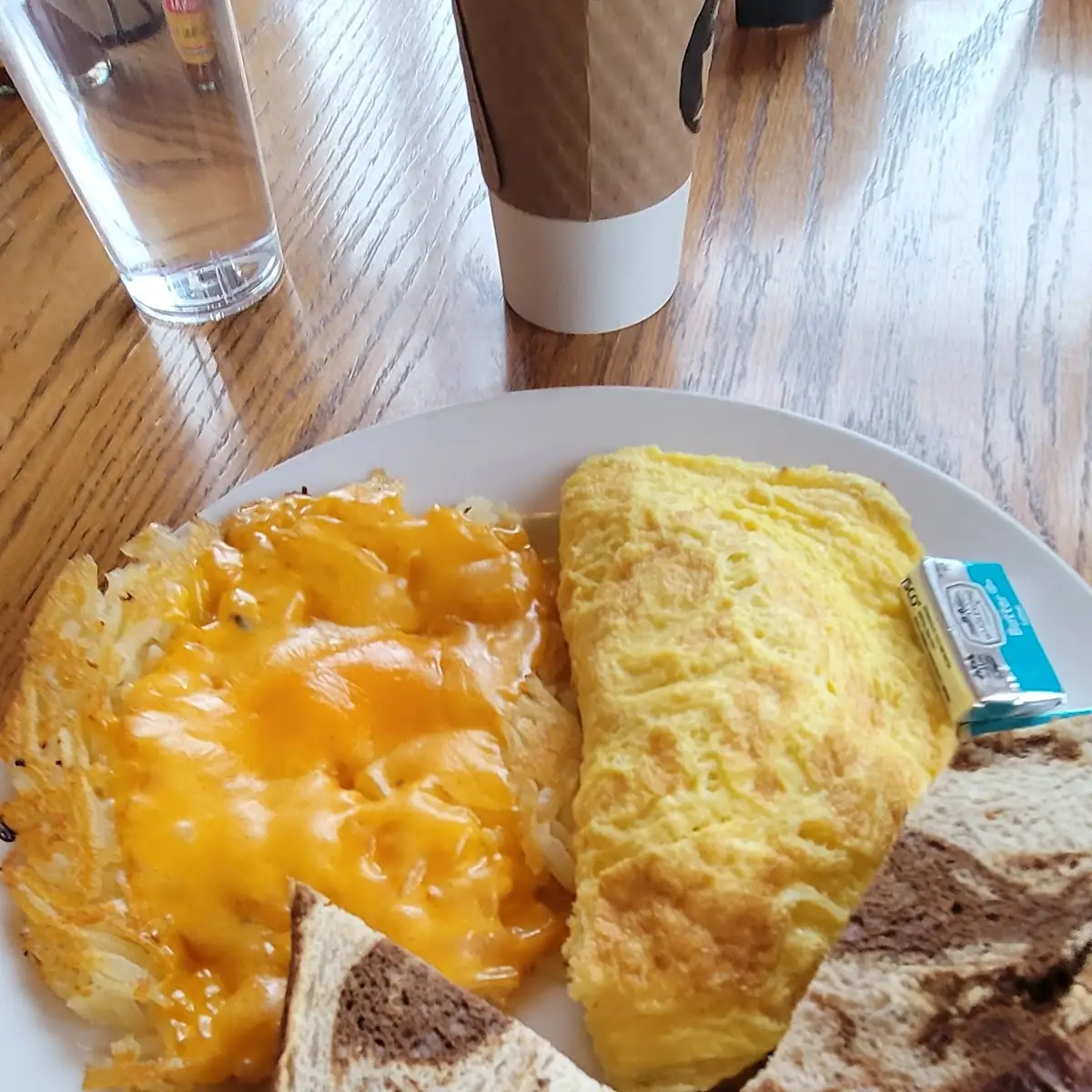 Meat Lovers Omelet with Cheesy Hashbrowns