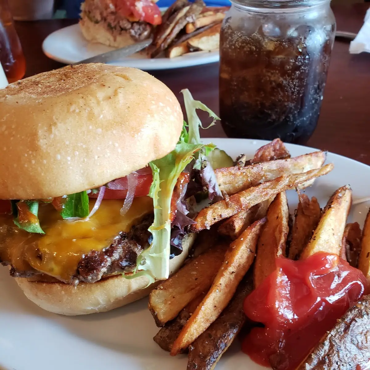 Beef Cheeseburger French Fries and a Coke