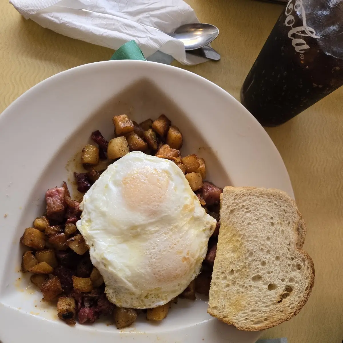 Corned Beef Hash with Eggs over Easy