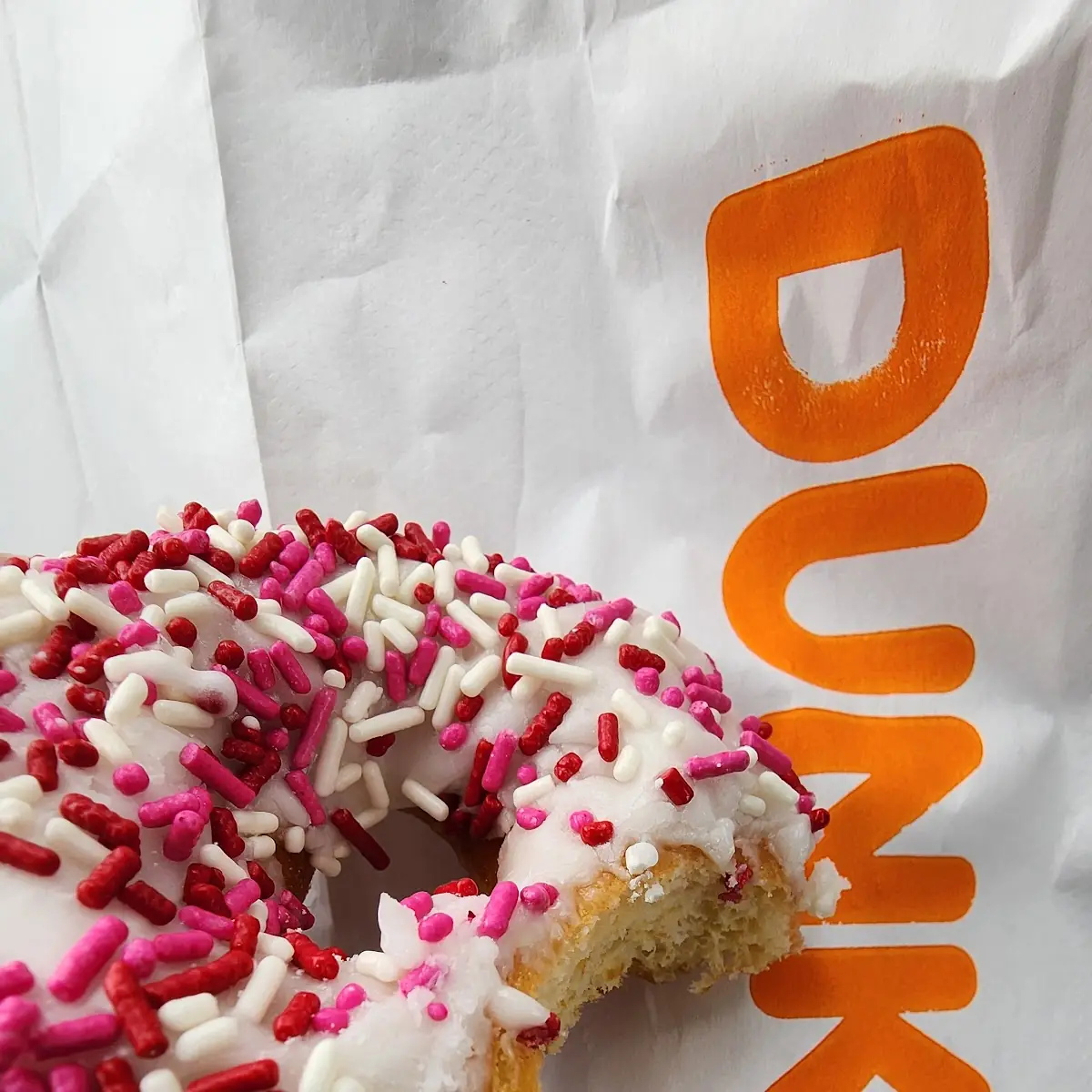 Vanilla Frosted Donut with Sprinkles