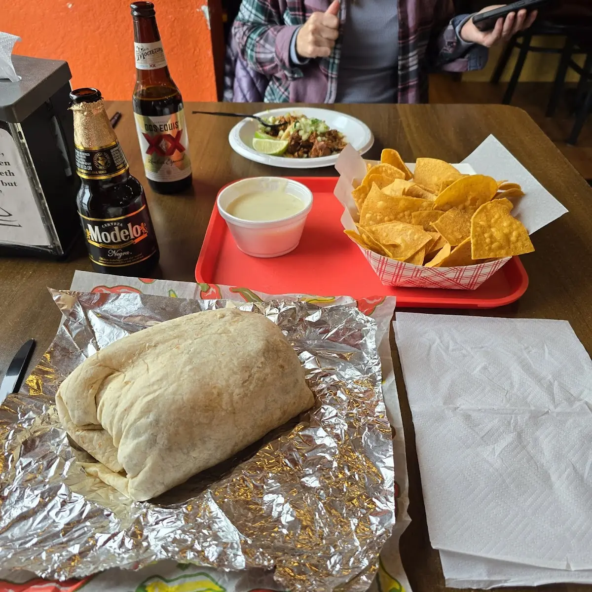 El Trio Burrito Chips N Queso Pastor Tacos Models Negro & Dos Equis Lager