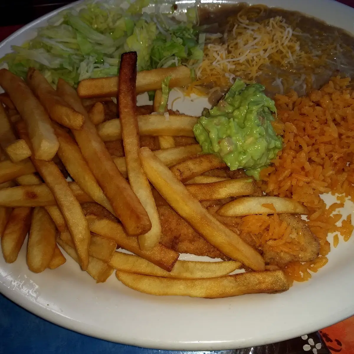Breaded Chicken Breast Covered with Fries