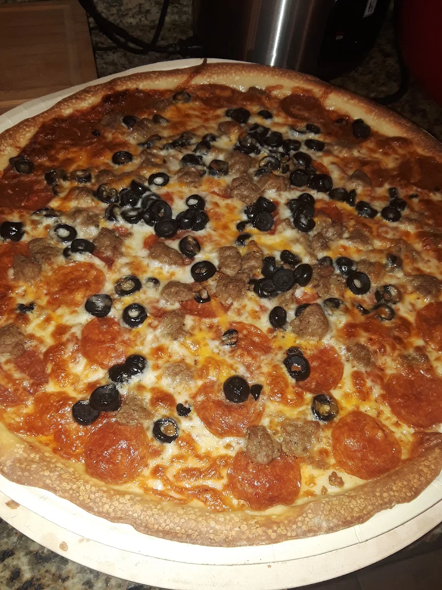 Sausage Pepproni and Black Olive Pizza