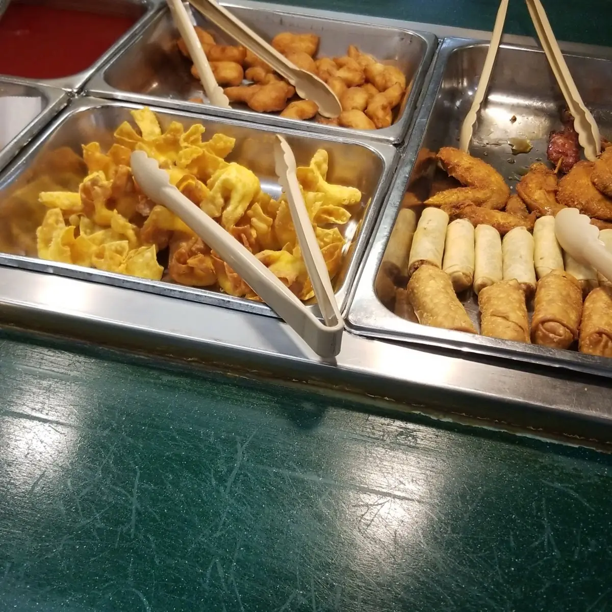 Fried Items Including Chicken Wings and Egg Rolls