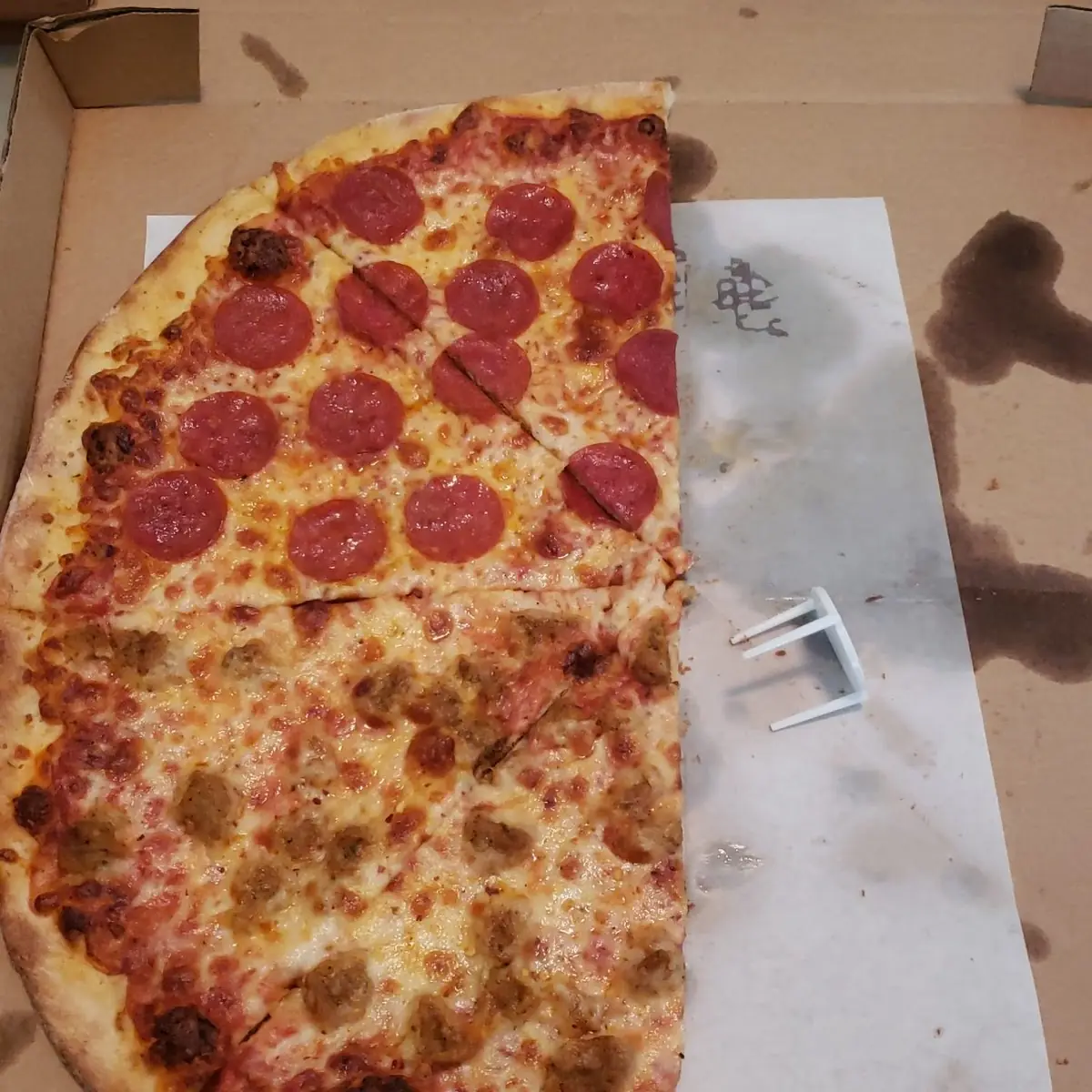 It Was Half Pepperoni and Half Sausage Pizza