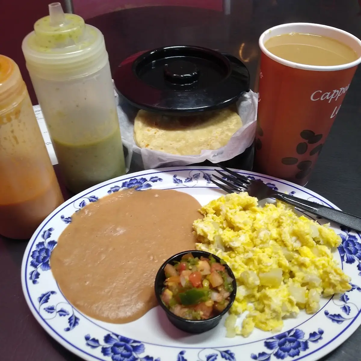 Eggs with Potatoes Refried Beans and Rice