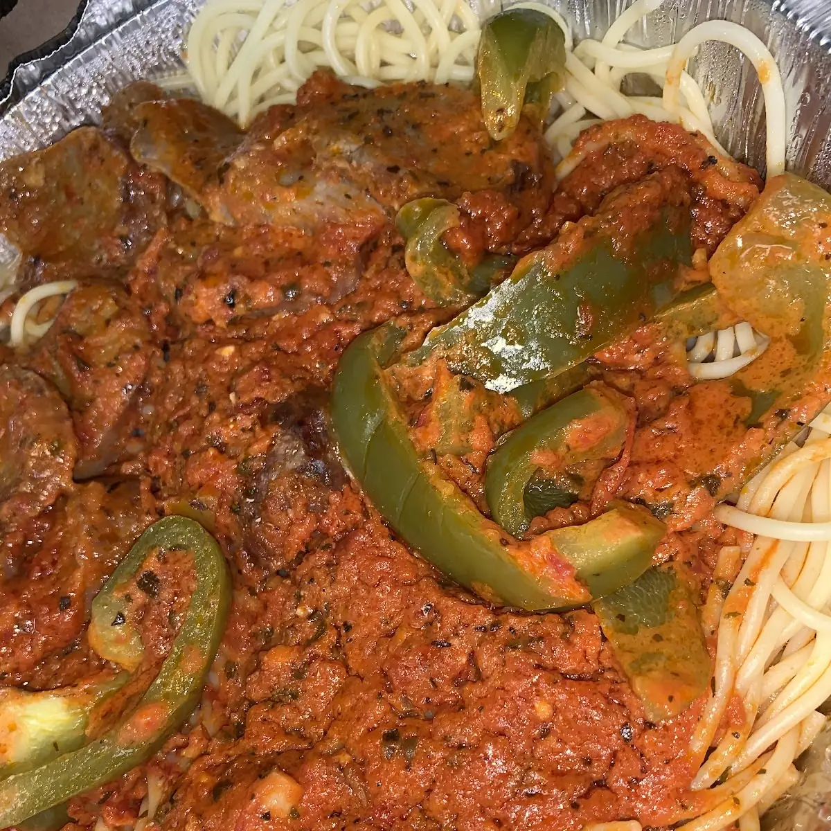 Sausage & Peppers over Spaghetti