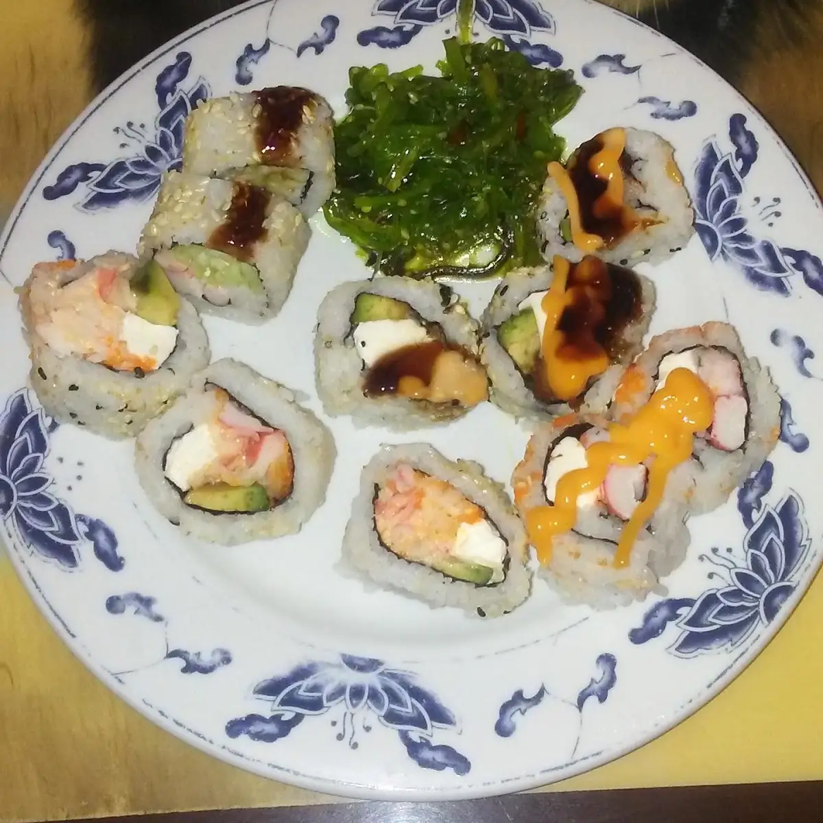 Assorted Sushi Rolls and Seaweed Salad