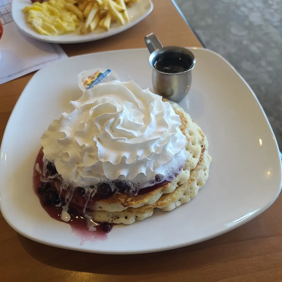 Short Stack with Blueberries and Whip Cream