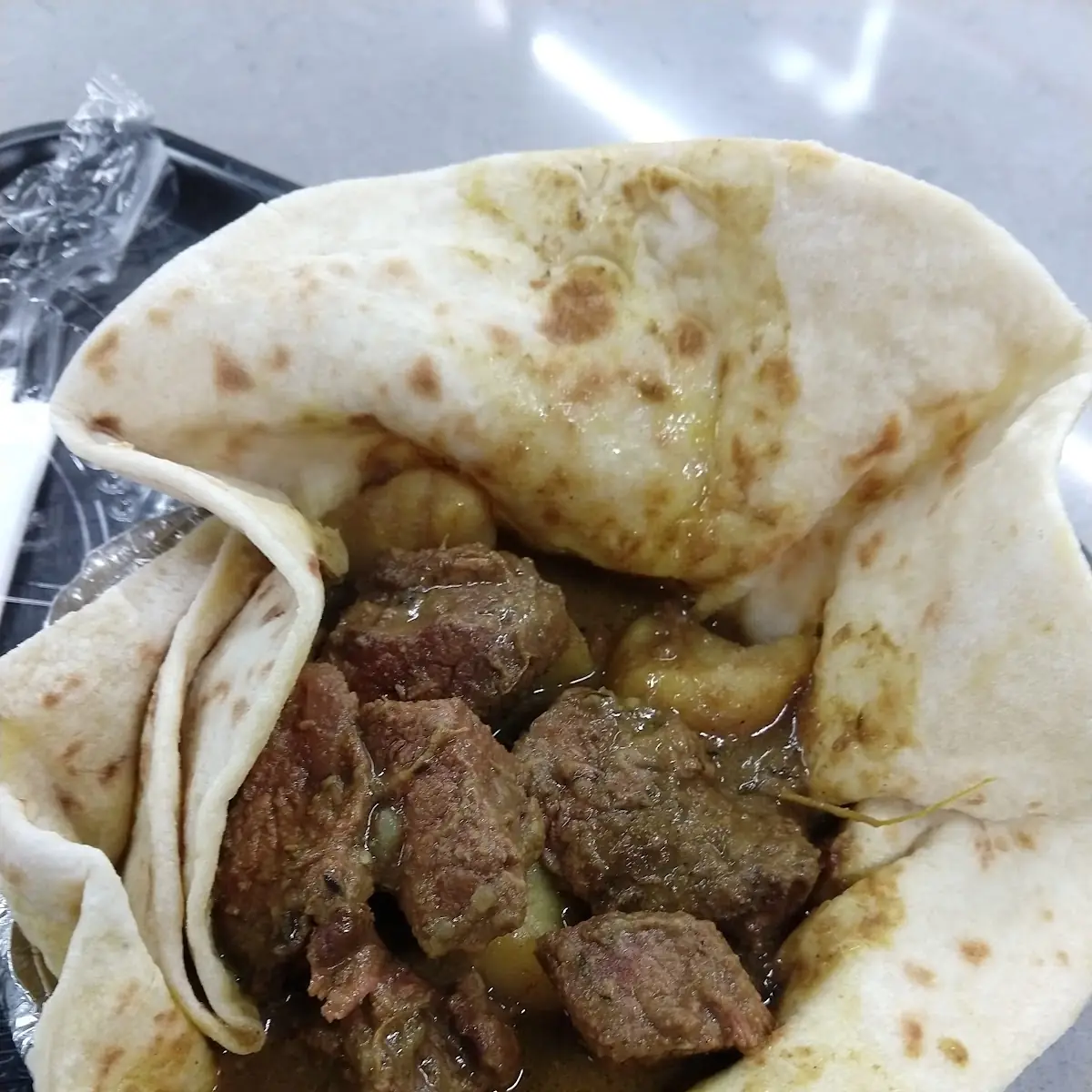 Stew Beef on Pouri Wrap