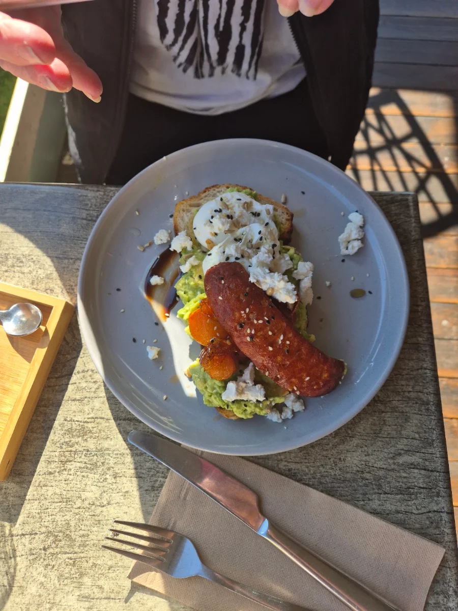 Smashed Avo with Poached Eggs and Chorizo on Sourdough Toast