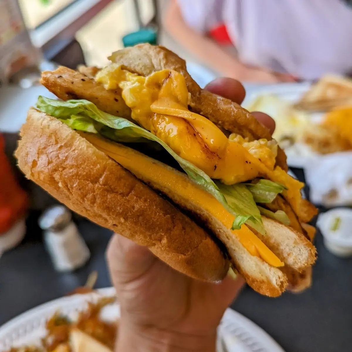 Grilled Cheese Inside a Chicken Sandwich with Scrambled Eggs