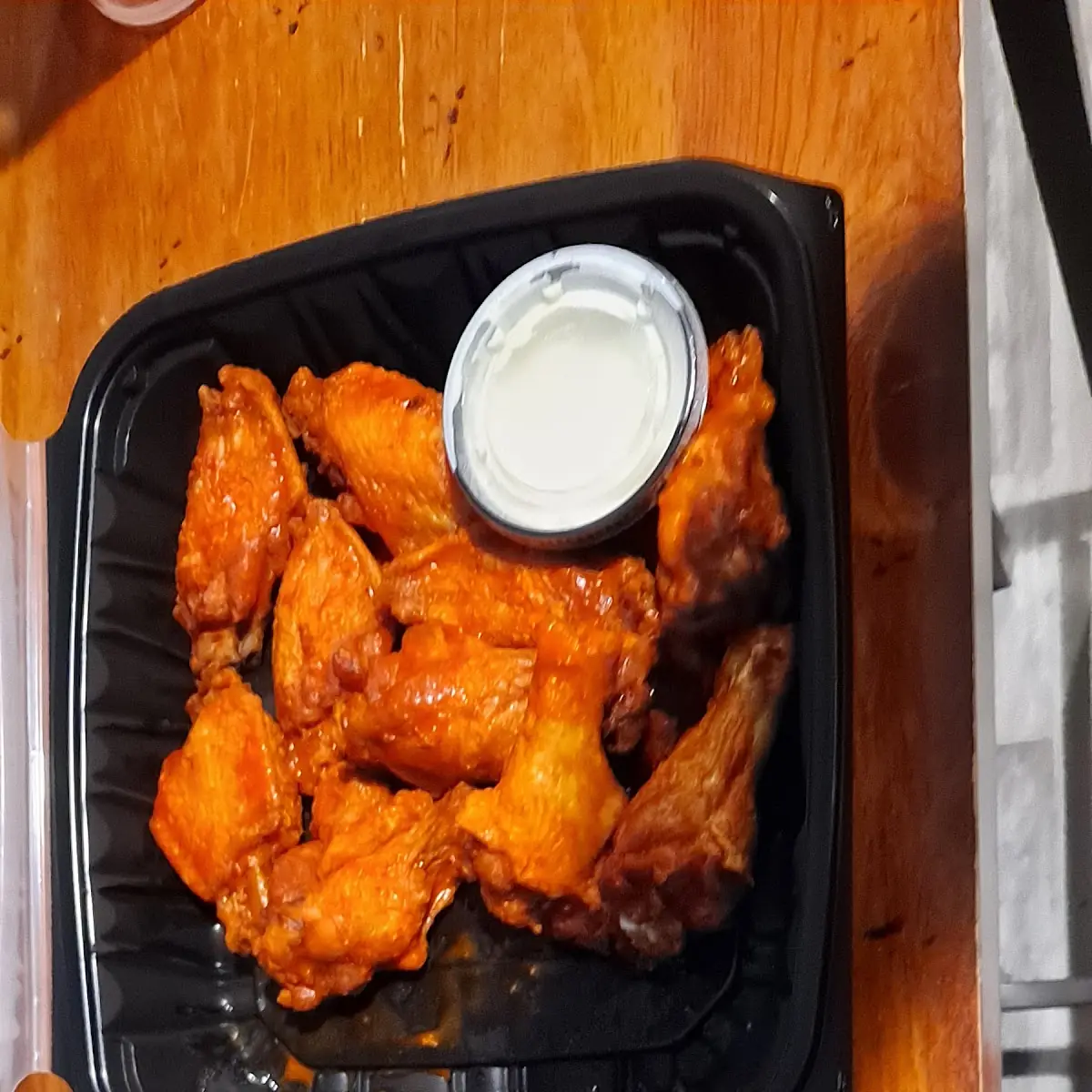 Buffalo Chicken Wings and Caesar Salad