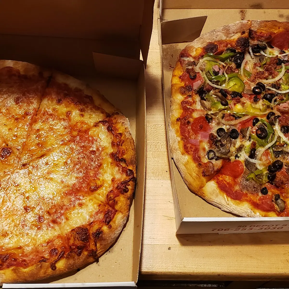 Cheese Pizza and Deluxe Pizza