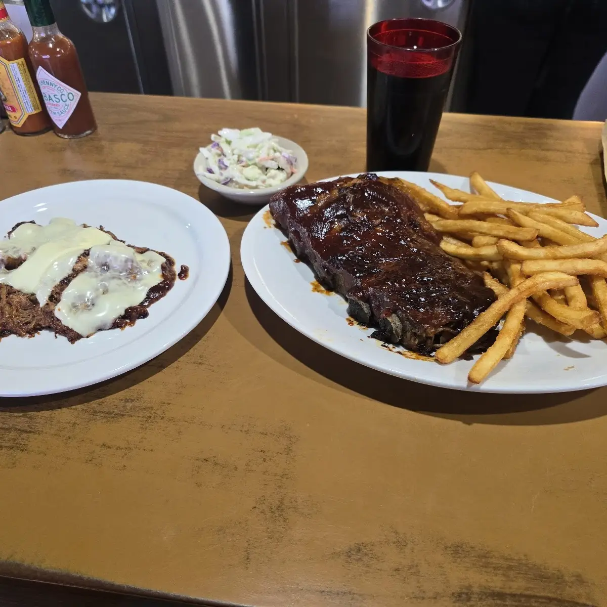 Half Rack of Ribs Fries and Some Pulled Pork with Cheese
