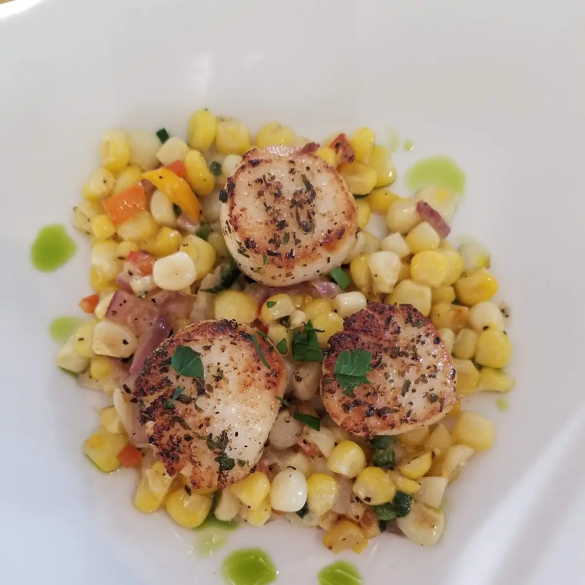 Blackened Sea Scallops with Atop Fresh Corn