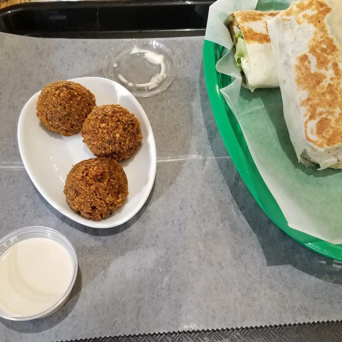 Crave Bowl Falafel and Chicken Shawarma Wrap