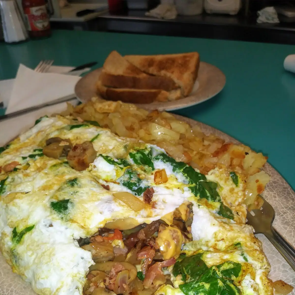 Egg White Spinach and Cheese Meat Lovers Omelette