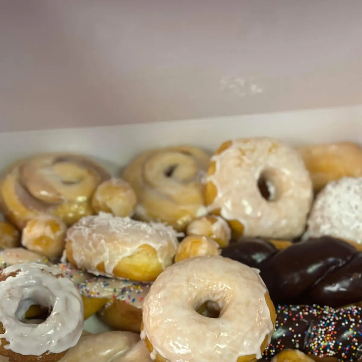 Assorted Glazed and Frosted Donuts