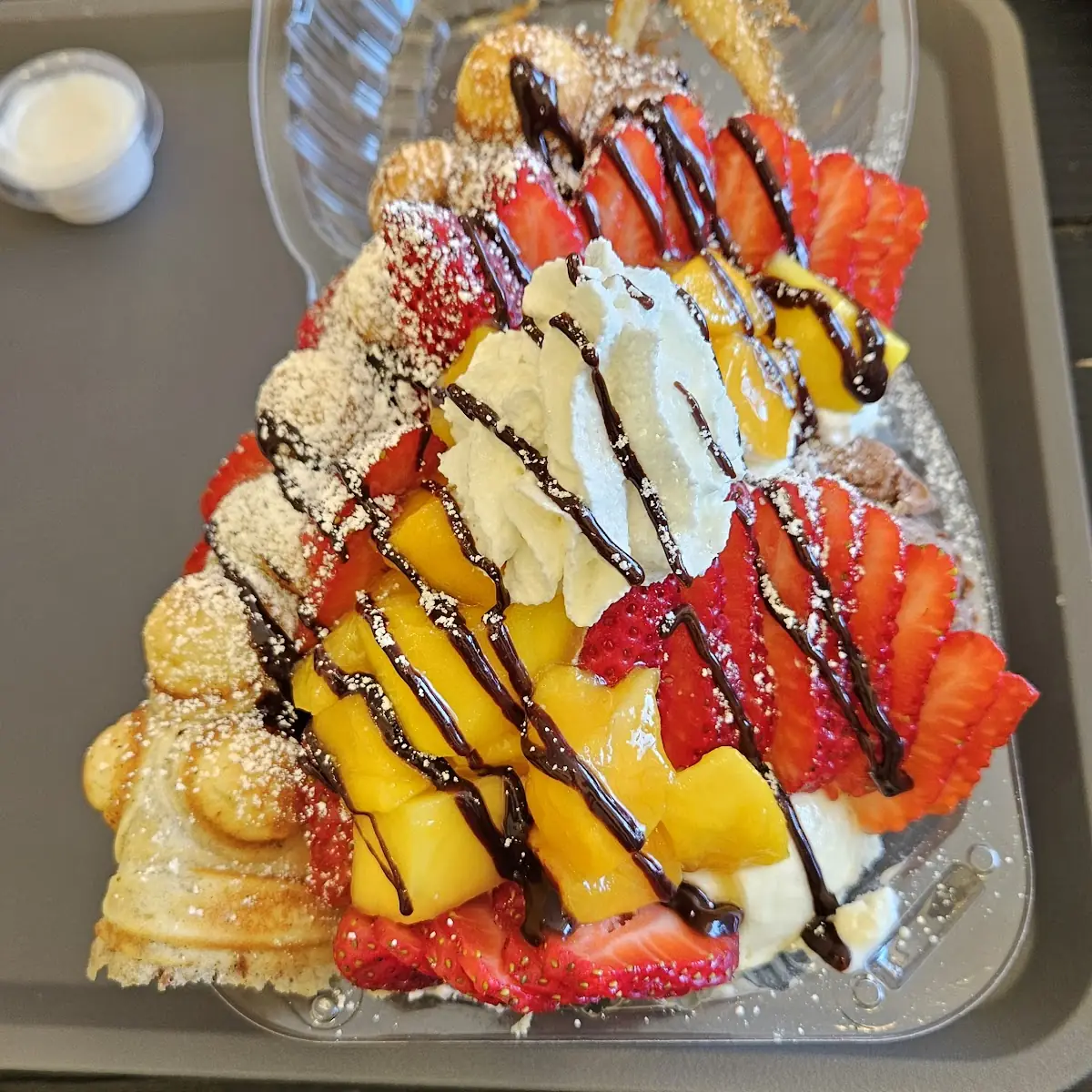 Deluxe Waffle with Mango Strawberry and Ice Cream