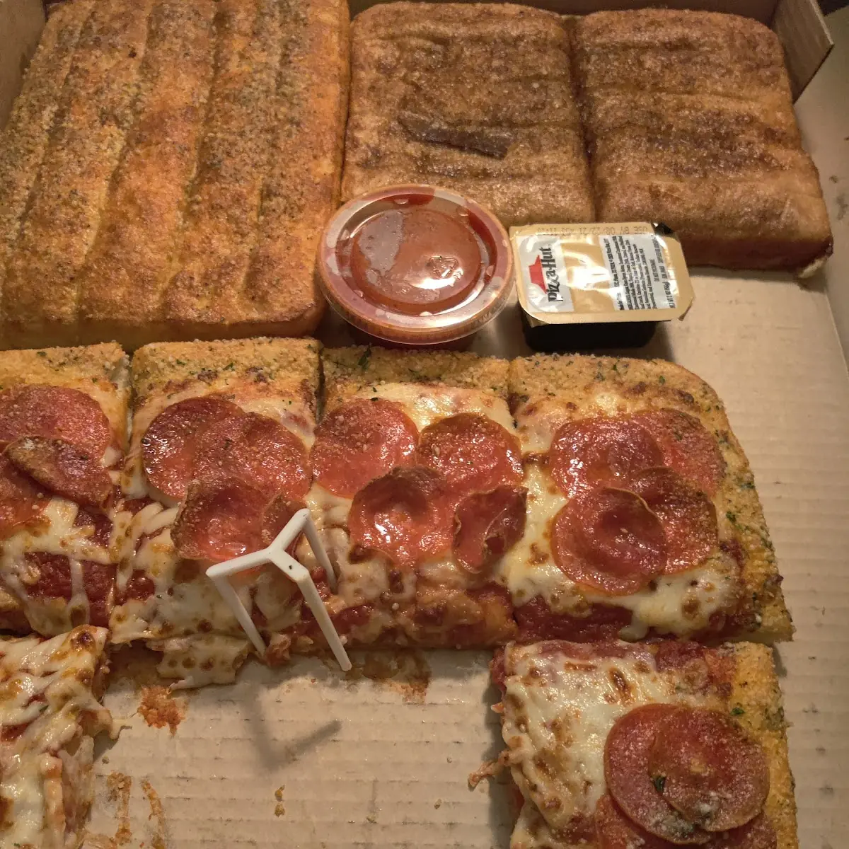 Pizza Box with Bread Sticks and Cinnamon Sticks