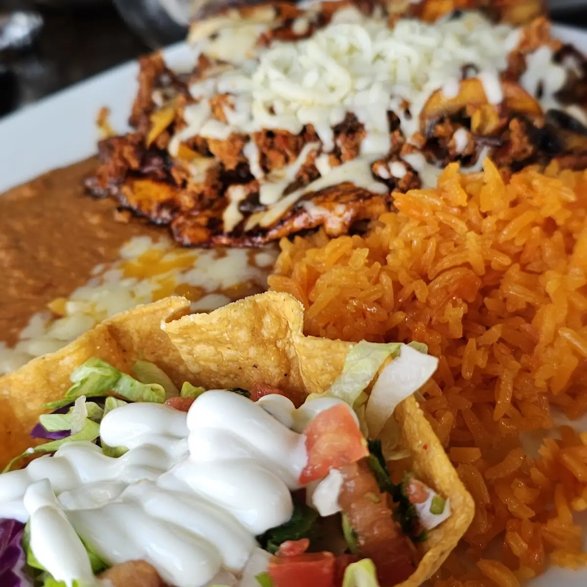 Beef Enchilada Chicken Tamale Rice & Beans