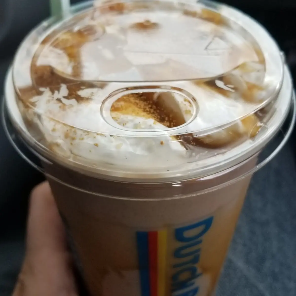 Blended Caramelizer with Caramel Drizzle Whipped Cream on Top Cinnamon Sprinkle and Raw Sugar