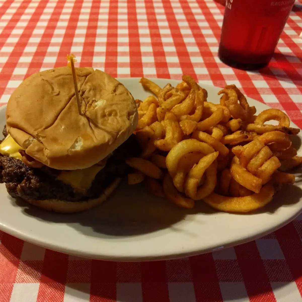 Regular Bacon Cheese Burger and Curly Fries