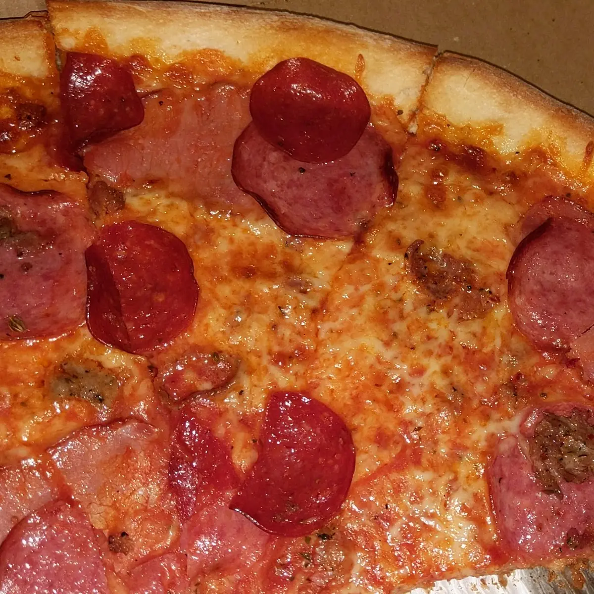 Sparsely Covered Meat Lovers Pizza