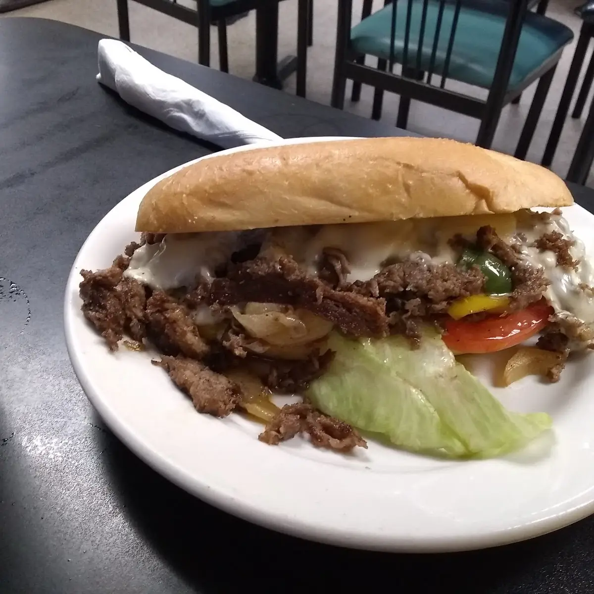 Philly Cheesesteak Sandwich with Lettuce and Tomato