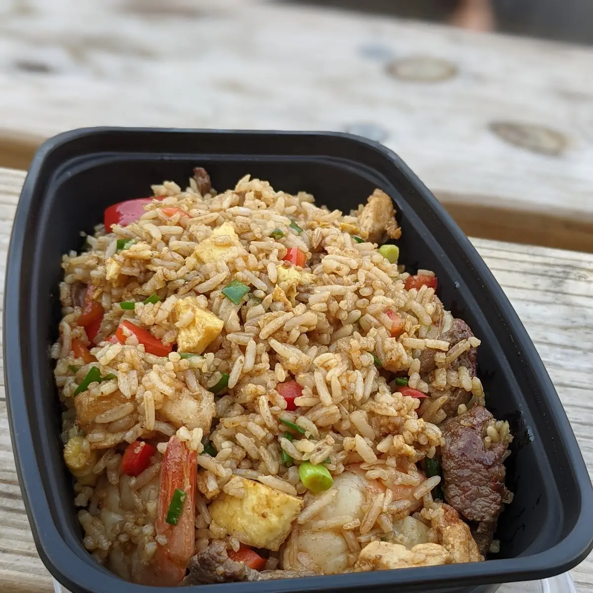 (1)Tallarin saltado beef + chaufa rice + maduros