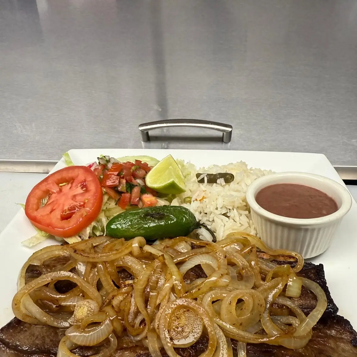Bistec Encebollado