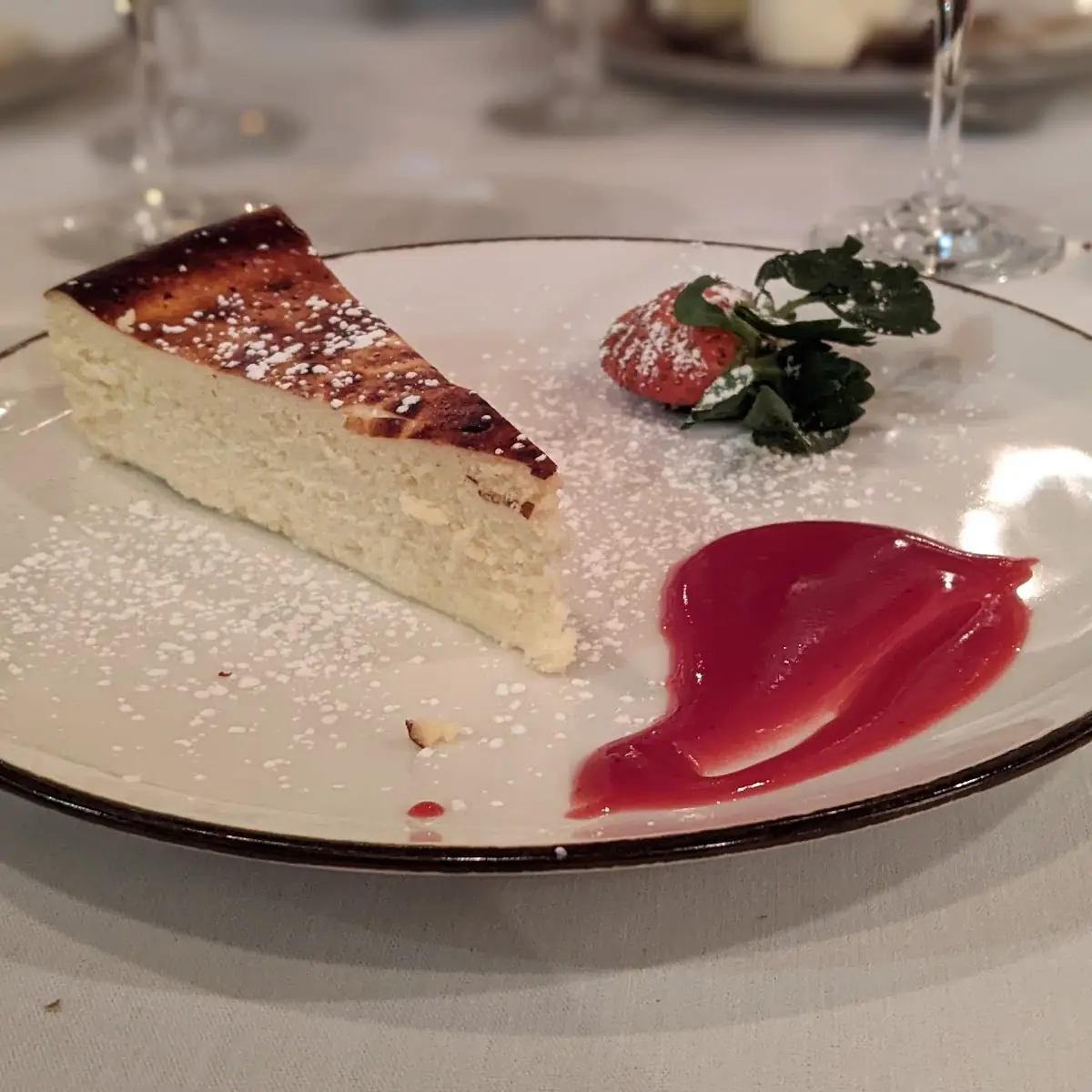 Burnt Basque Cheesecake with Strawberry Coulis