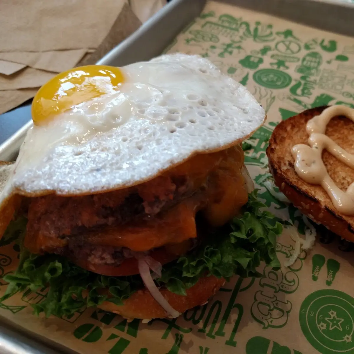 Super Burger with Cheese Everything Grilled Onions and Fried Egg