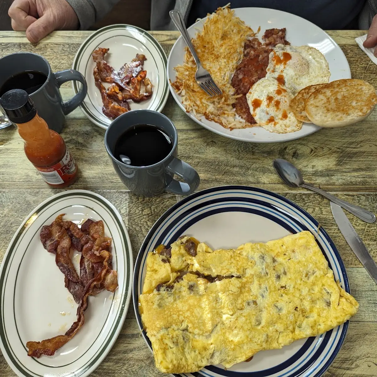 3 Egg Omelettes with Home Fries & Toast with 1 Item