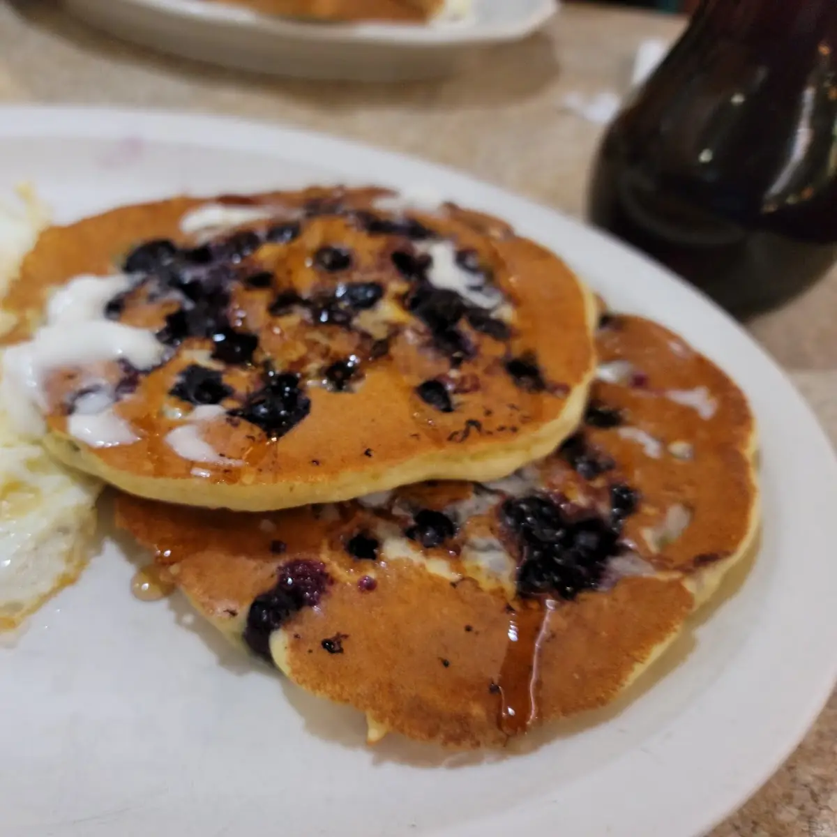 Blueberry Pancakes with Eggs Any Style