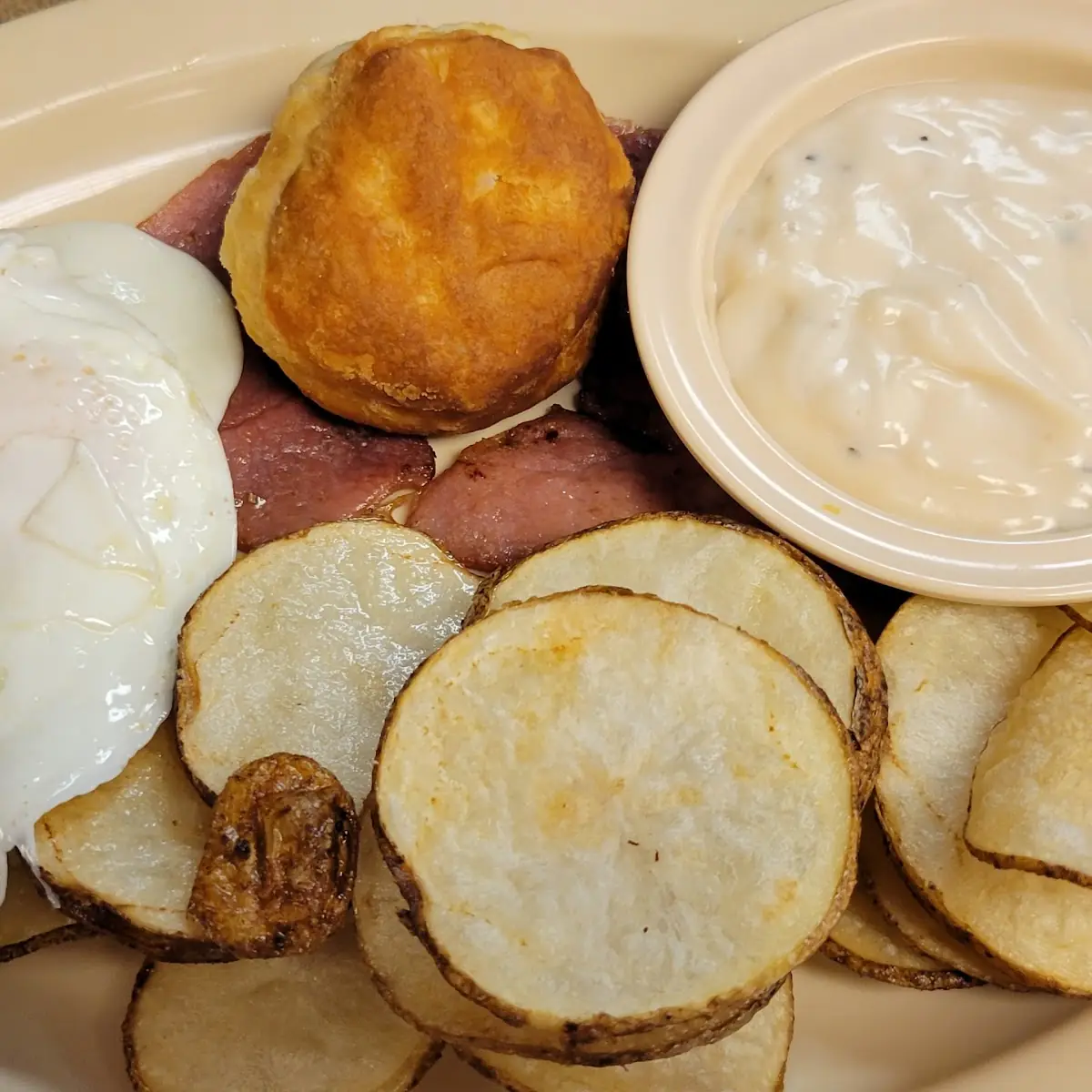 One Egg over Medium Really Crisp Potato Slices Biscuits and Gravy & Country Ham