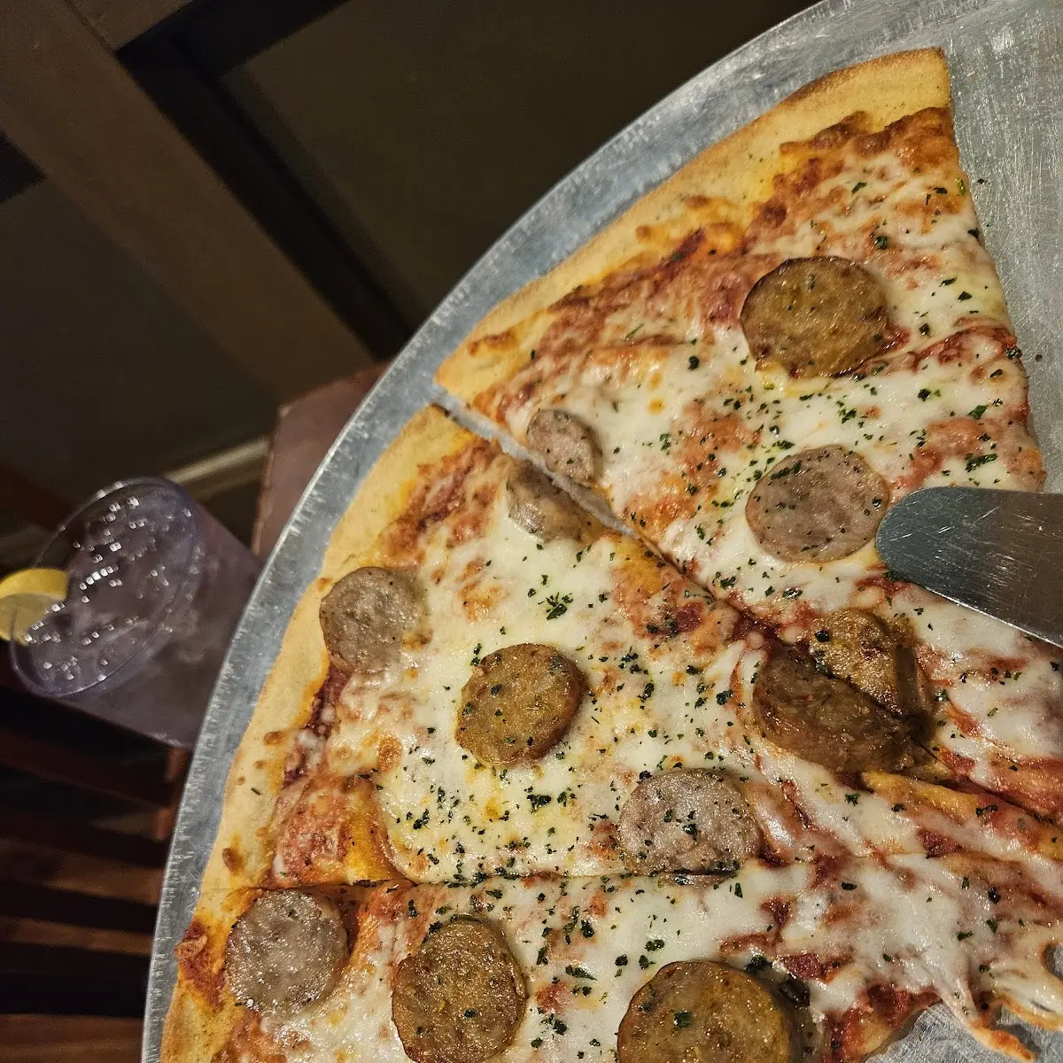 Pizza with Sausage and Sautéed Spinach