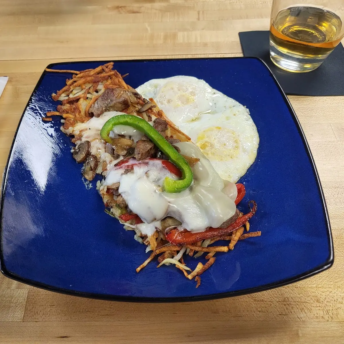 Philly Cheesesteak Loaded Hash Browns and Eggs
