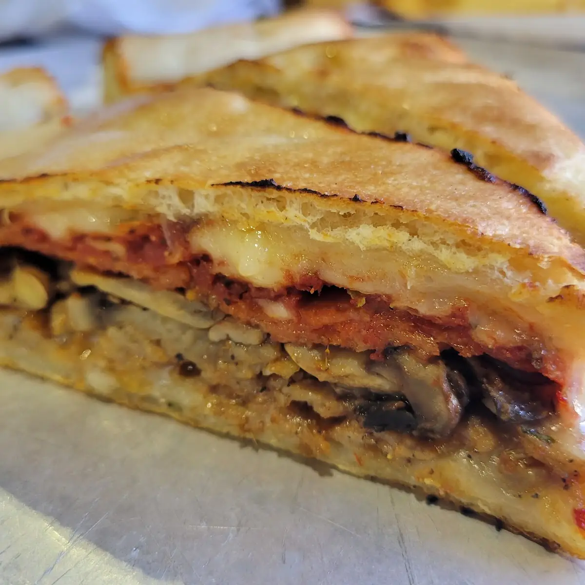 Stuffed Meat Pizza Slice