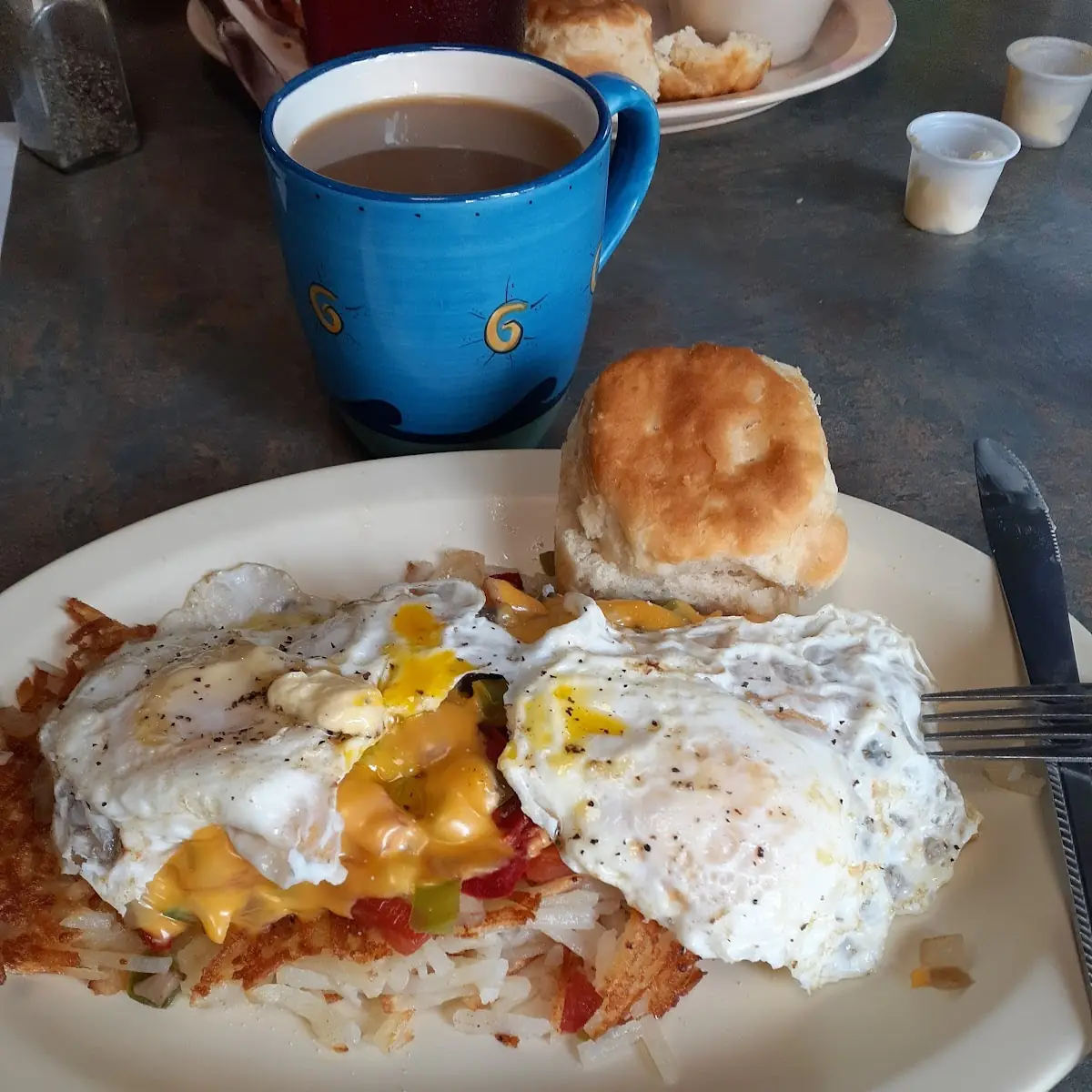 Veggie Hash Browns Topped with Two Eggs