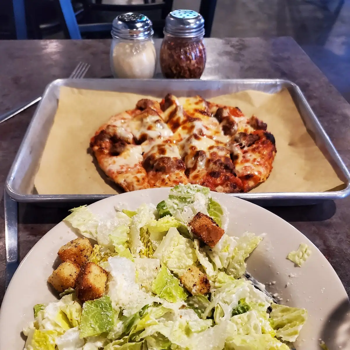 Caesar Side Salad and Sausage Pizza