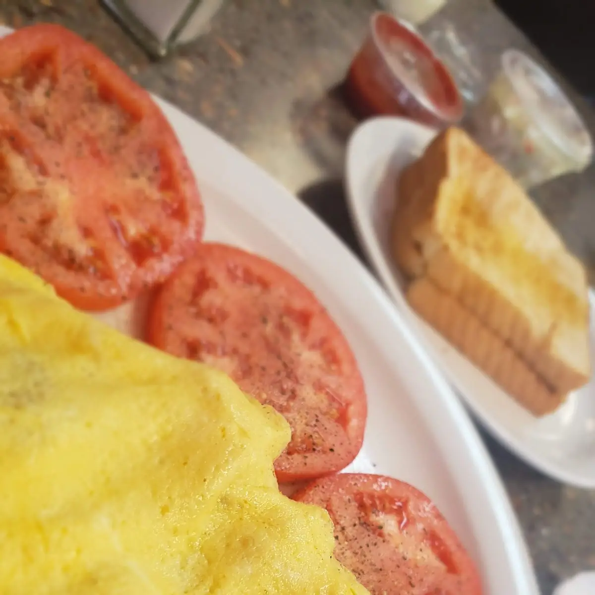 Seafood Omelet with Sliced Tomatoes