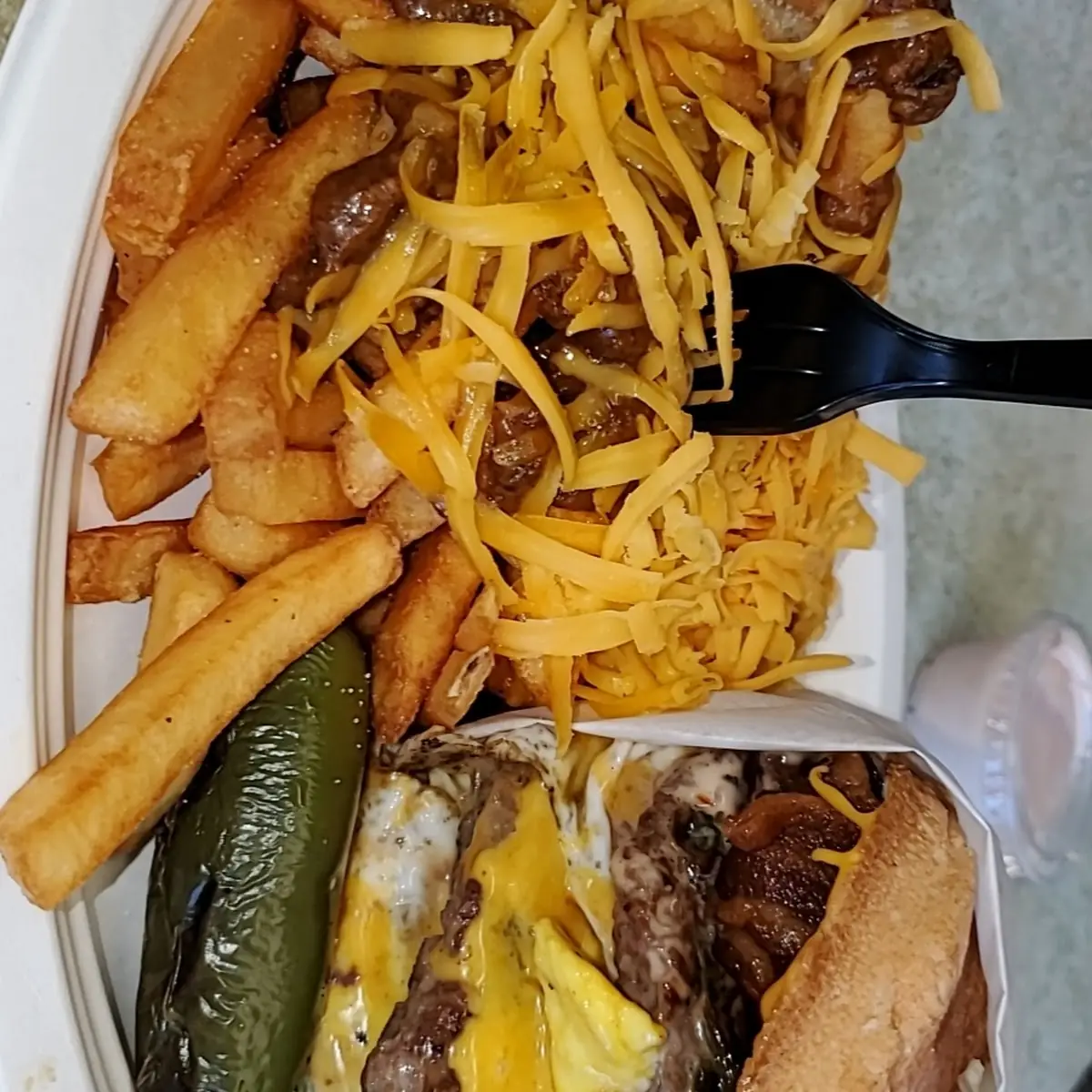 The Double Texas Style Chili Cheese Burger with Egg