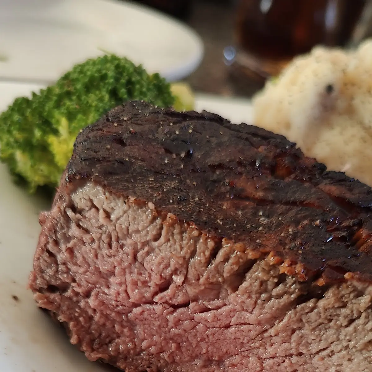 Filet Mignon with Mashed Potatoes Broccoli and Mushroom Gravy
