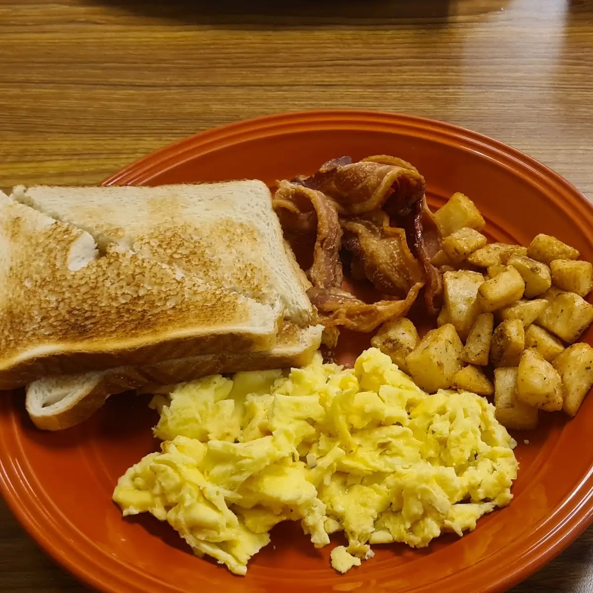 Eggs Cinnamon Roll French Toast and Baco