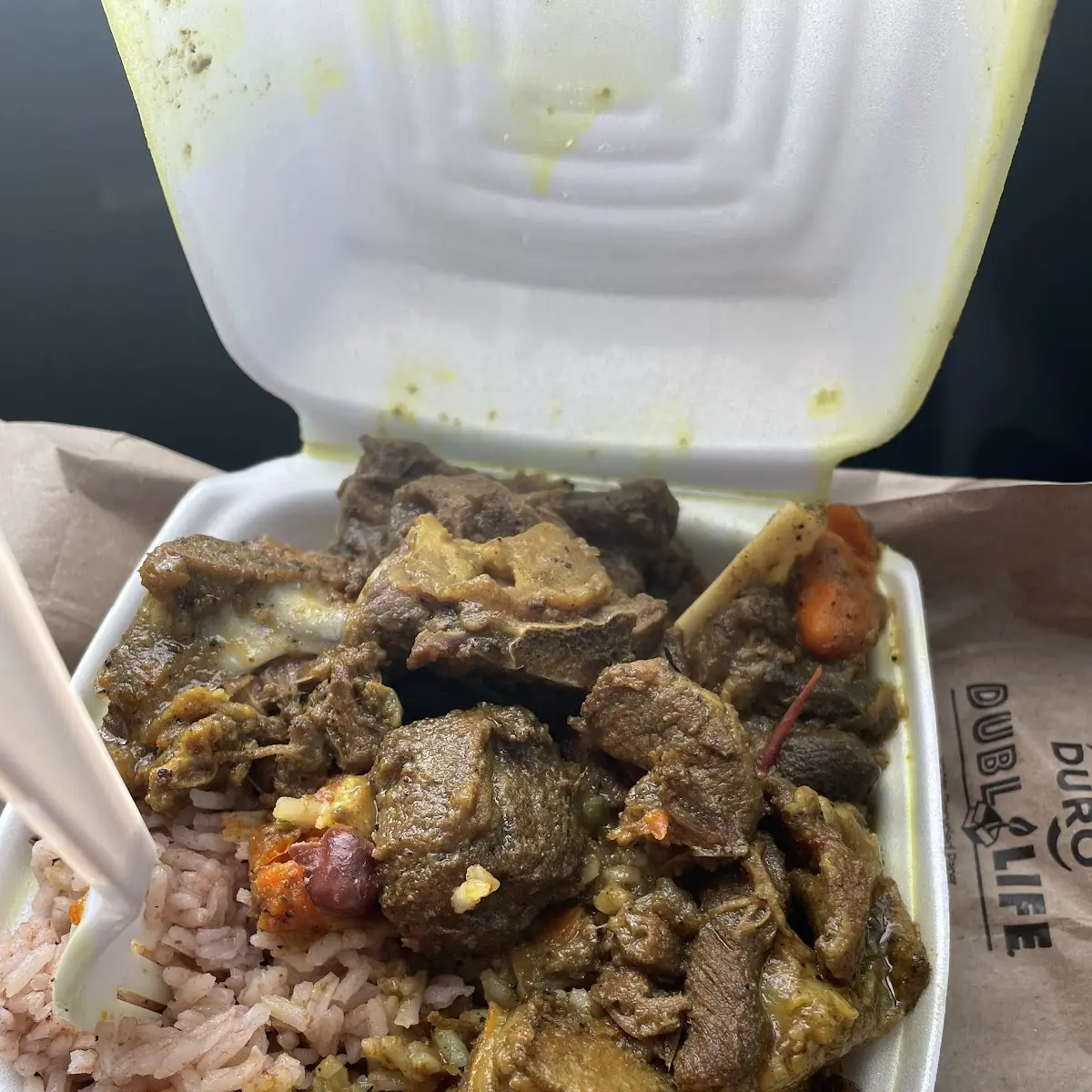 Curry Goat with Rice and Peas